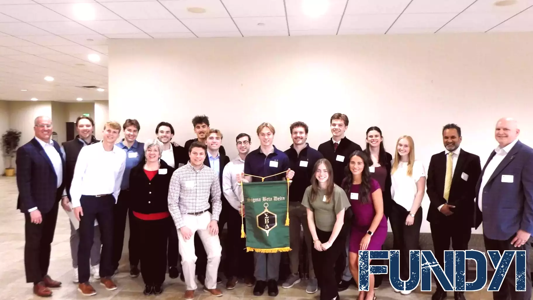 Sigma Beta Delta inducts 26 students, honors alum leaders at annual ceremony